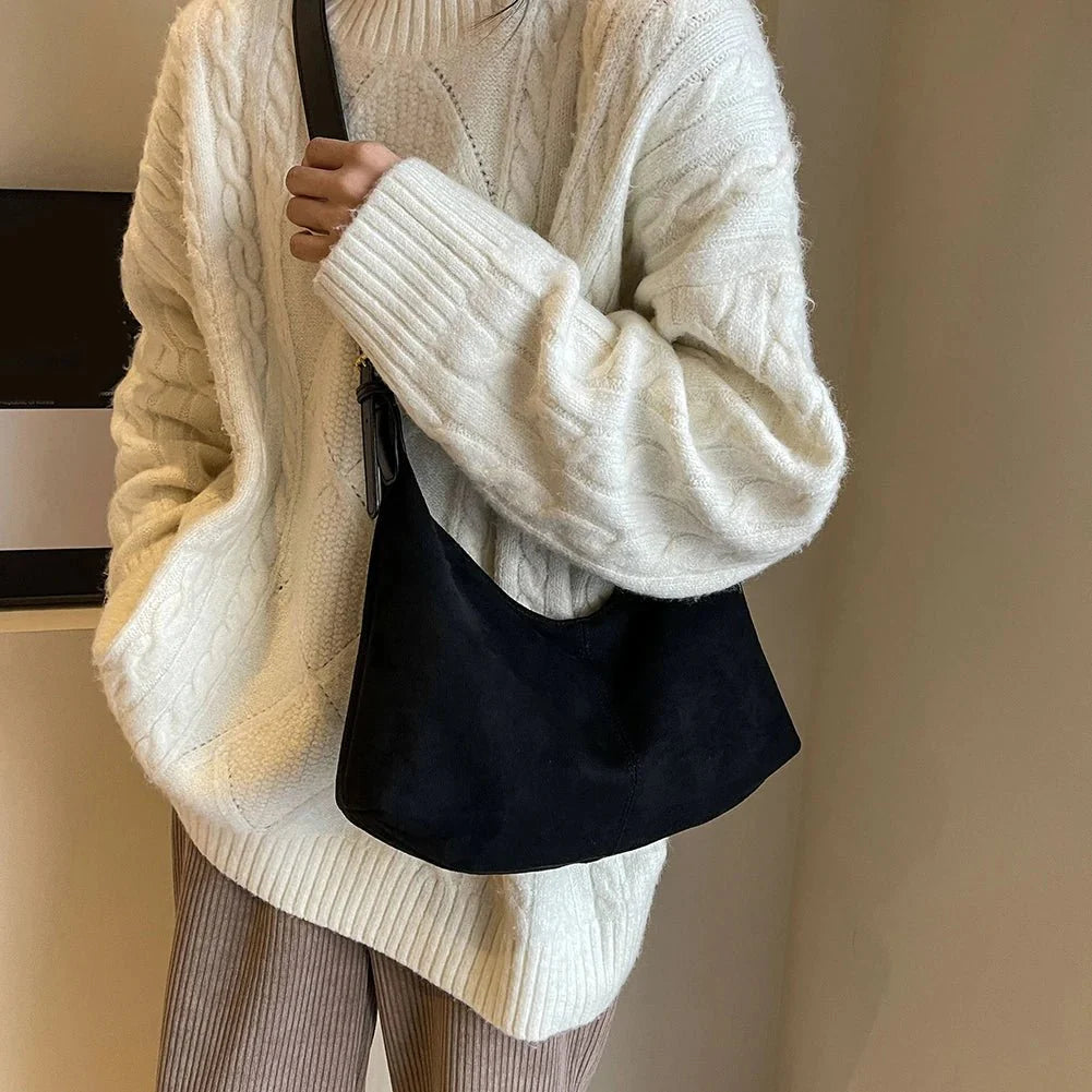 Suede crescent crossbody bag