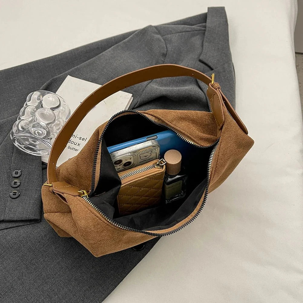 Suede crescent crossbody bag
