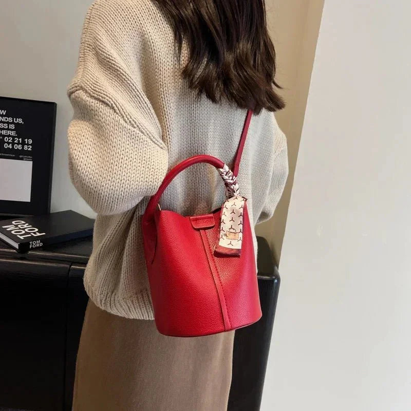 Leather red bucket crossbody bag