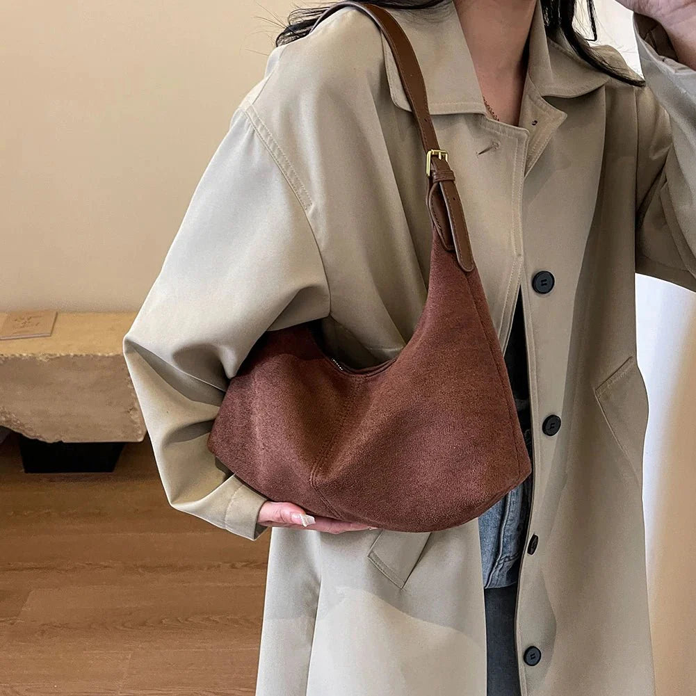 Suede crescent crossbody bag