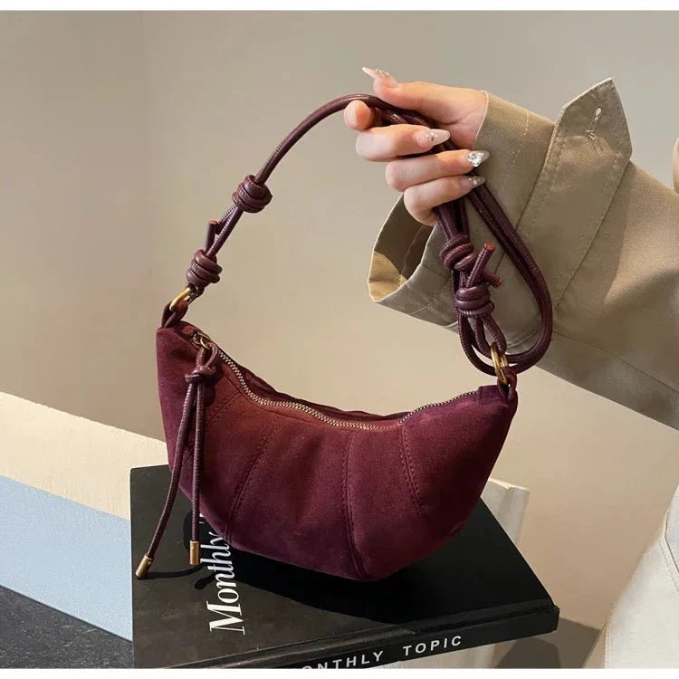 Suede crescent crossbody bag