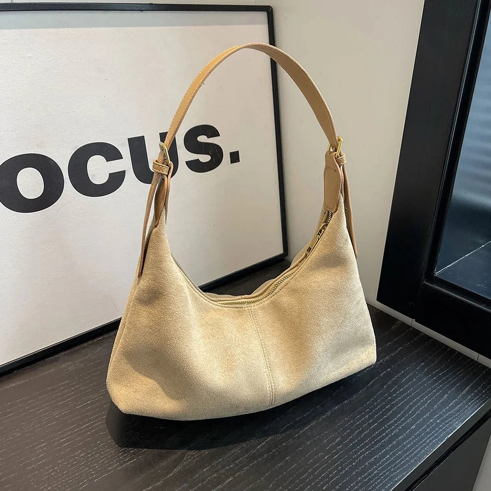 Suede crescent crossbody bag