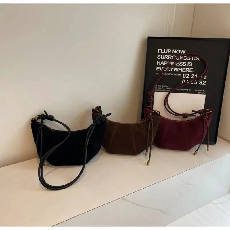 Suede crescent crossbody bag