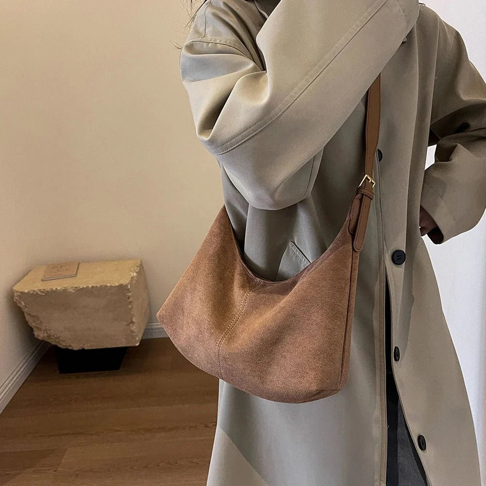 Suede crescent crossbody bag