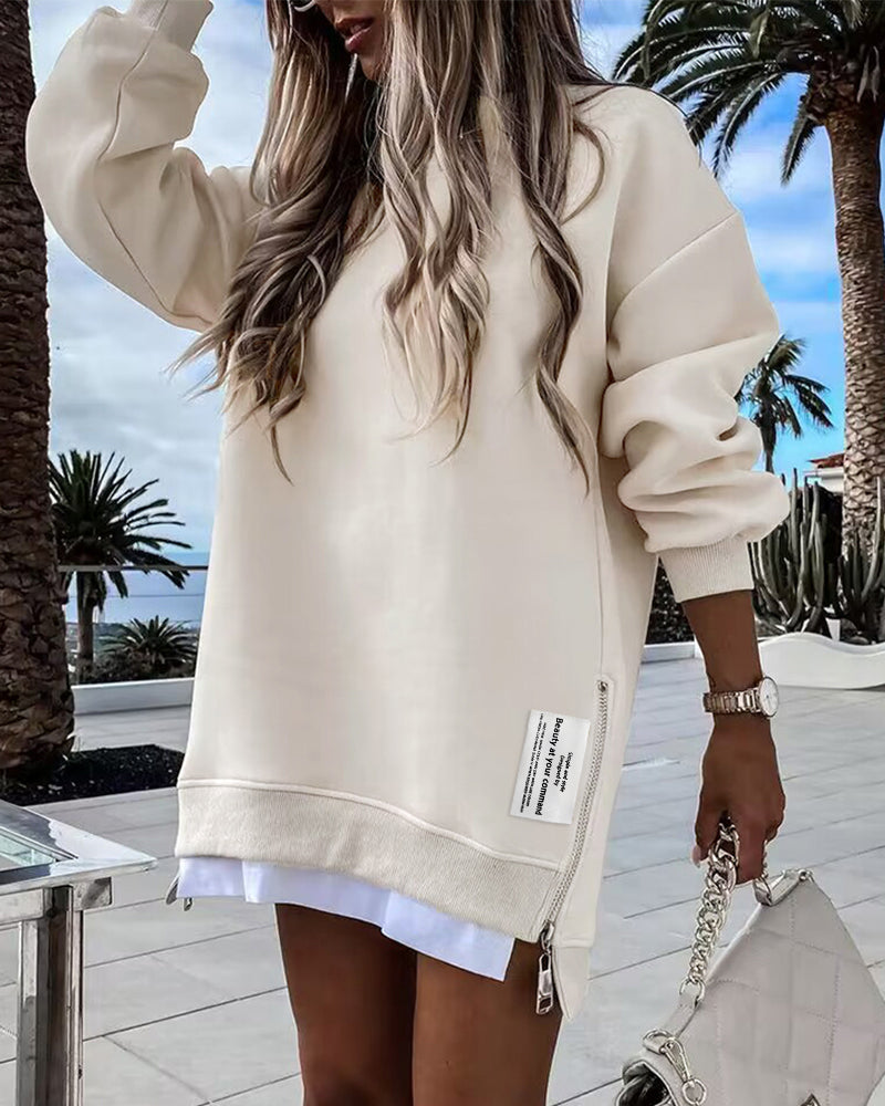 Drop Shoulder Zip-Side Long Sleeve Pullover with Slit Detail.