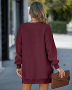 Drop Shoulder Zip-Side Long Sleeve Pullover with Slit Detail.