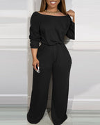 Off-Shoulder Jumpsuit with Elastic Waist, Pockets, and V-Back Design