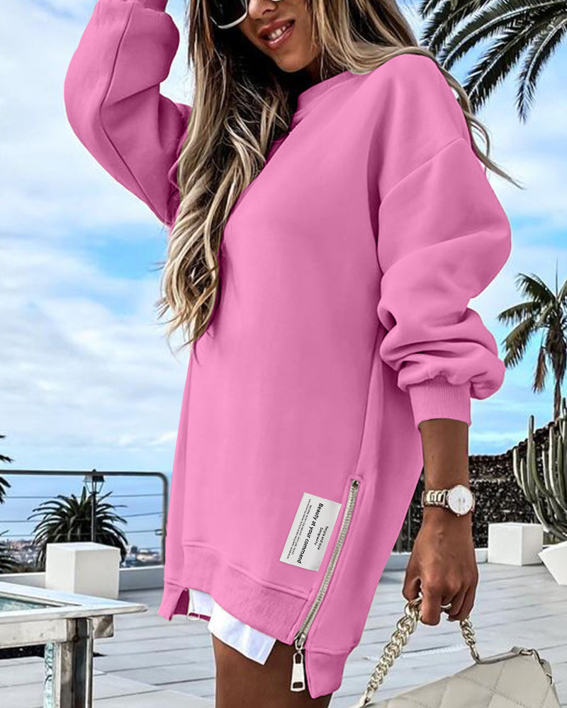 Drop Shoulder Zip-Side Long Sleeve Pullover with Slit Detail.