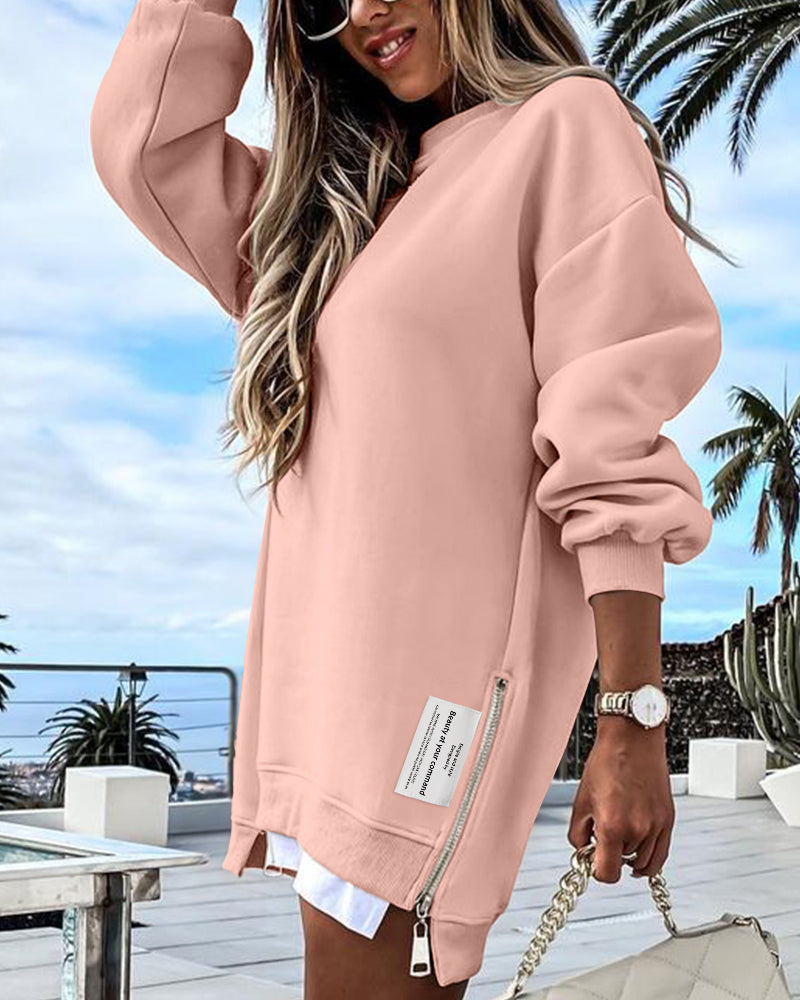 Drop Shoulder Zip-Side Long Sleeve Pullover with Slit Detail.