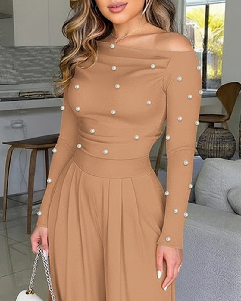Pearl-Adorned Asymmetrical Neck Ruched Jumpsuit with Cinched Waist