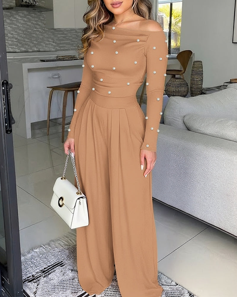 Pearl-Adorned Asymmetrical Neck Ruched Jumpsuit with Cinched Waist