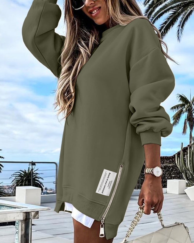 Drop Shoulder Zip-Side Long Sleeve Pullover with Slit Detail.