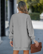 Drop Shoulder Zip-Side Long Sleeve Pullover with Slit Detail.