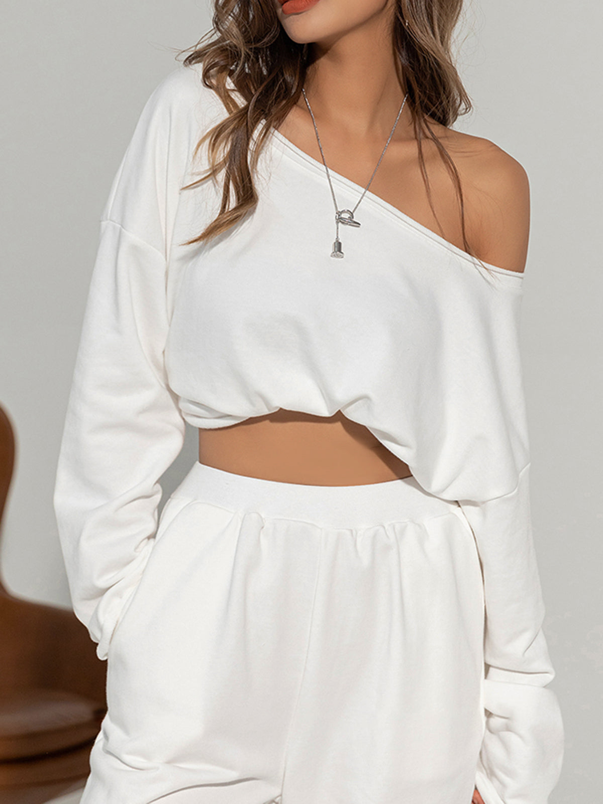 Off-Shoulder Asymmetrical Sweatshirt in Solid Color