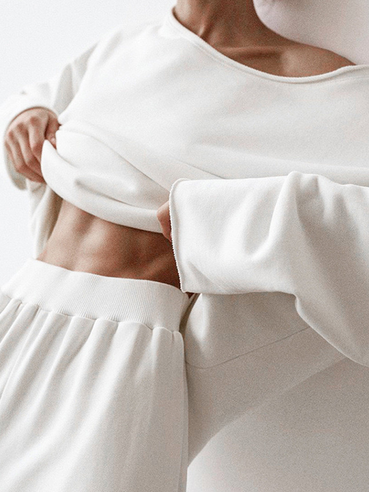 Off-Shoulder Asymmetrical Sweatshirt in Solid Color