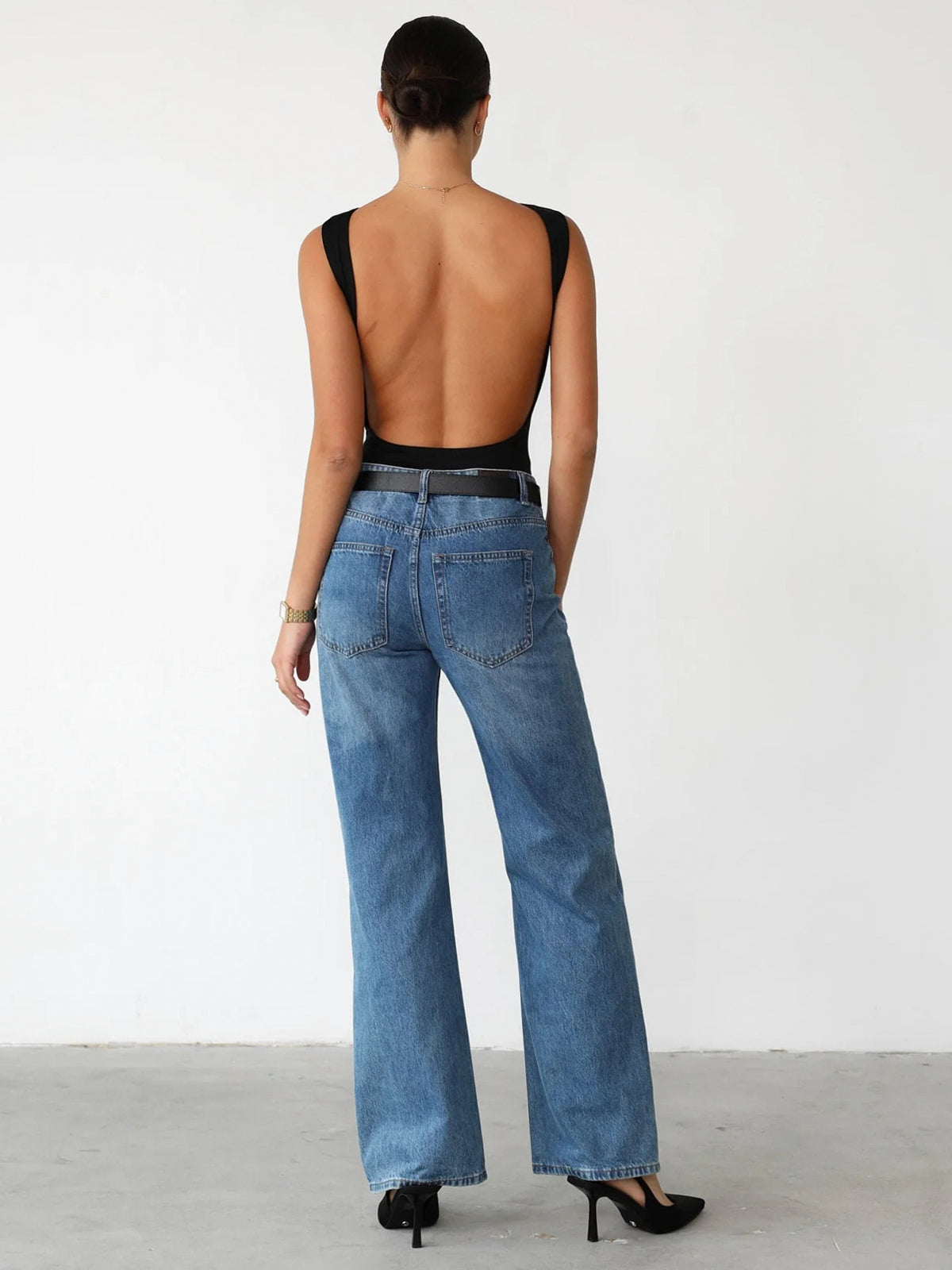 Slinky Sleeveless Bodysuit with Open Back Design