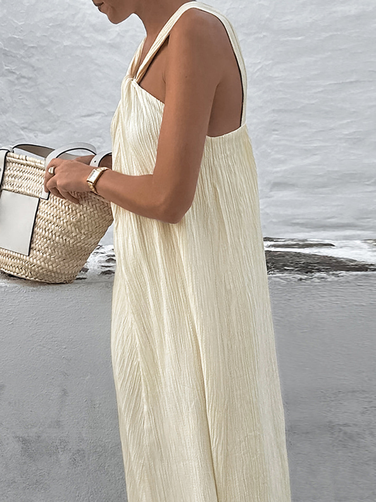 Elegant Cream Halter Dress with Long Flowing Skirt