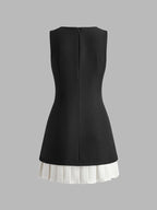 Two-Tone Sleeveless Dress with Pleated Skirt
