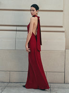Elegant Halter Dress with Flowing Satin and Open Back