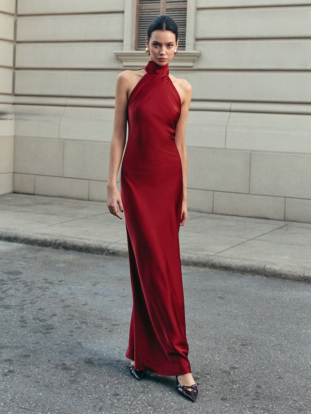 Elegant Halter Dress with Flowing Satin and Open Back