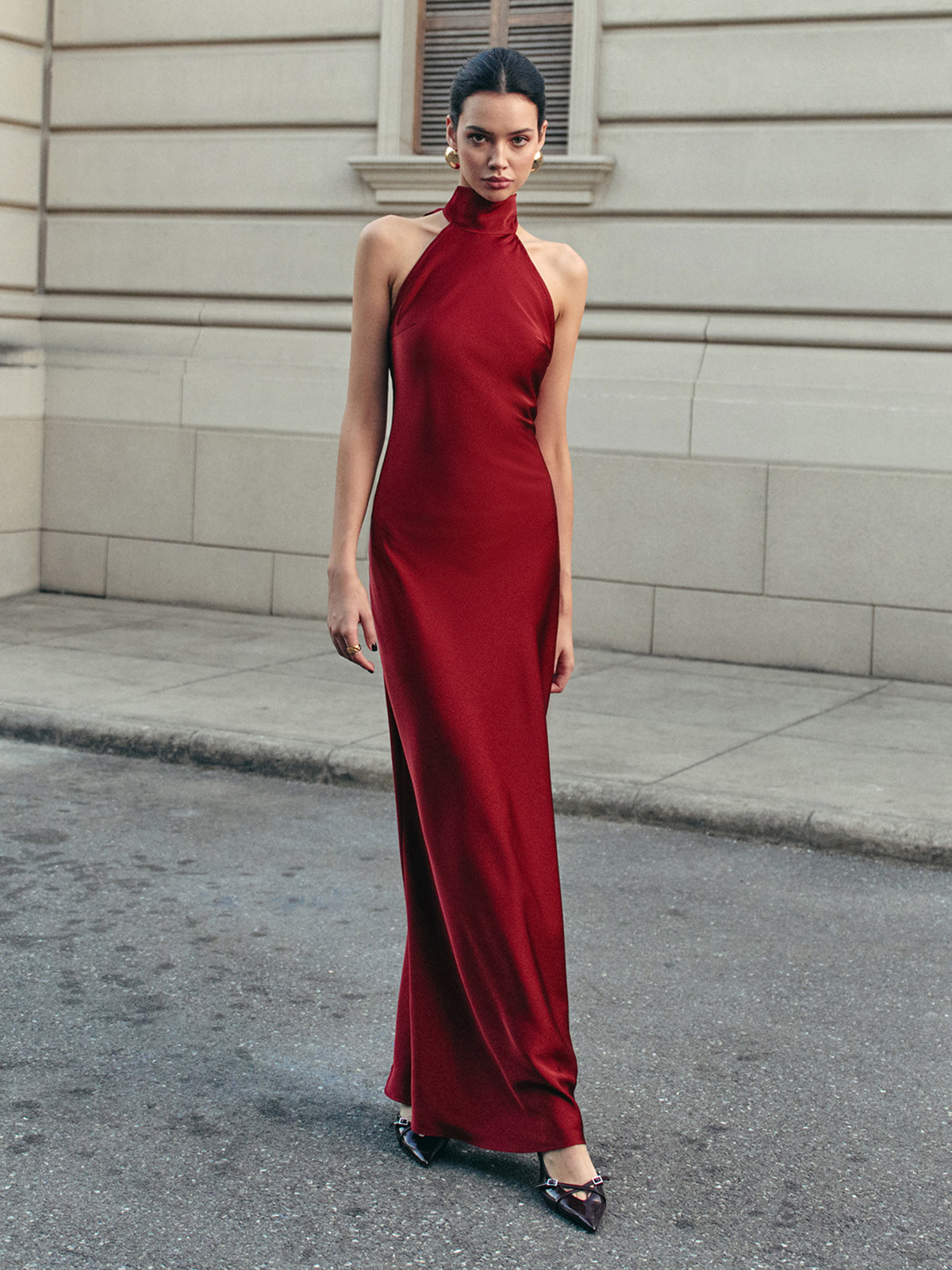 Elegant Halter Dress with Flowing Satin and Open Back