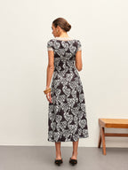 V-Neck Dress with Floral Print and Tie-Bow