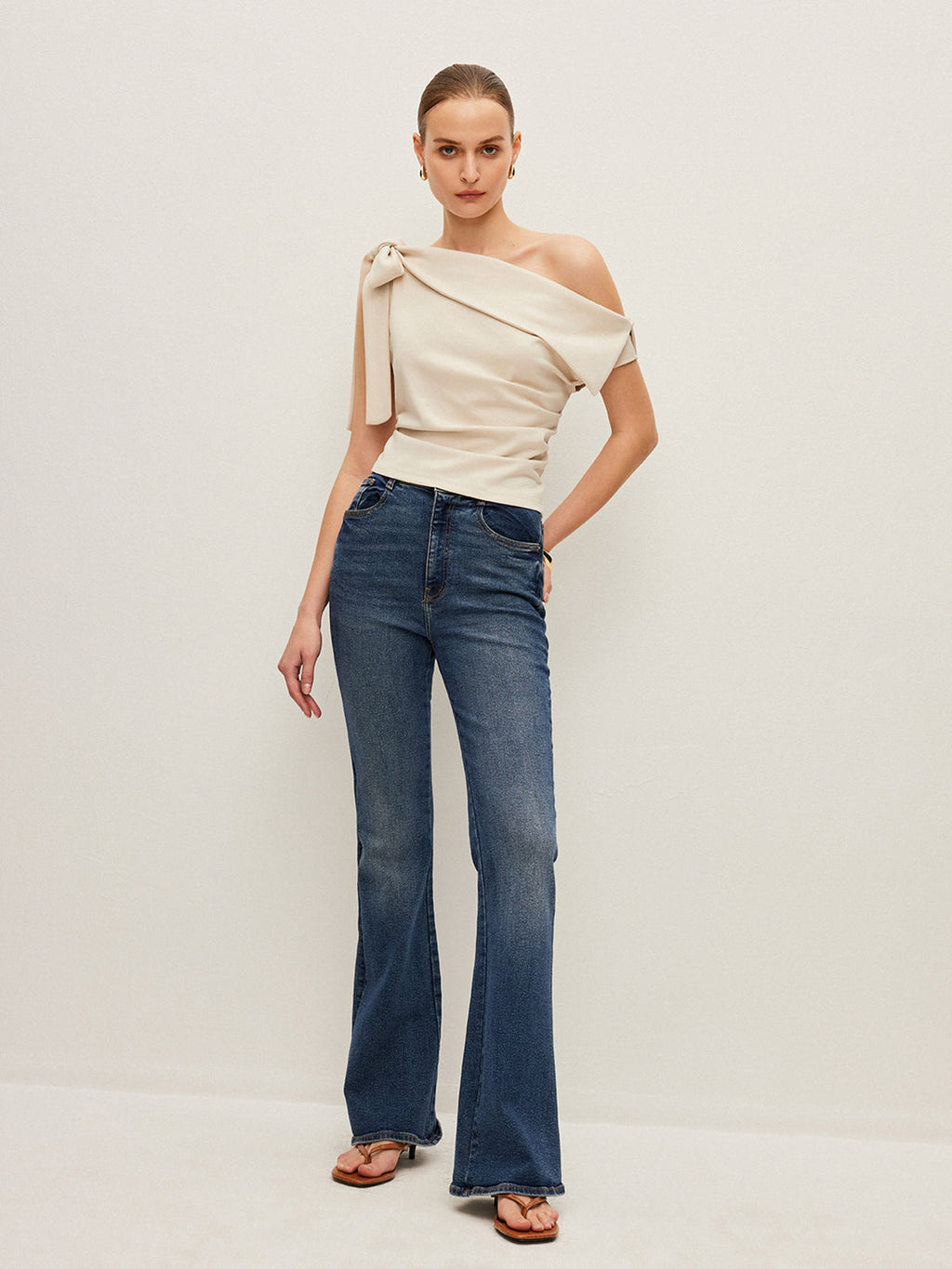 One-Shoulder Blouse Featuring Elegant Bow Detail