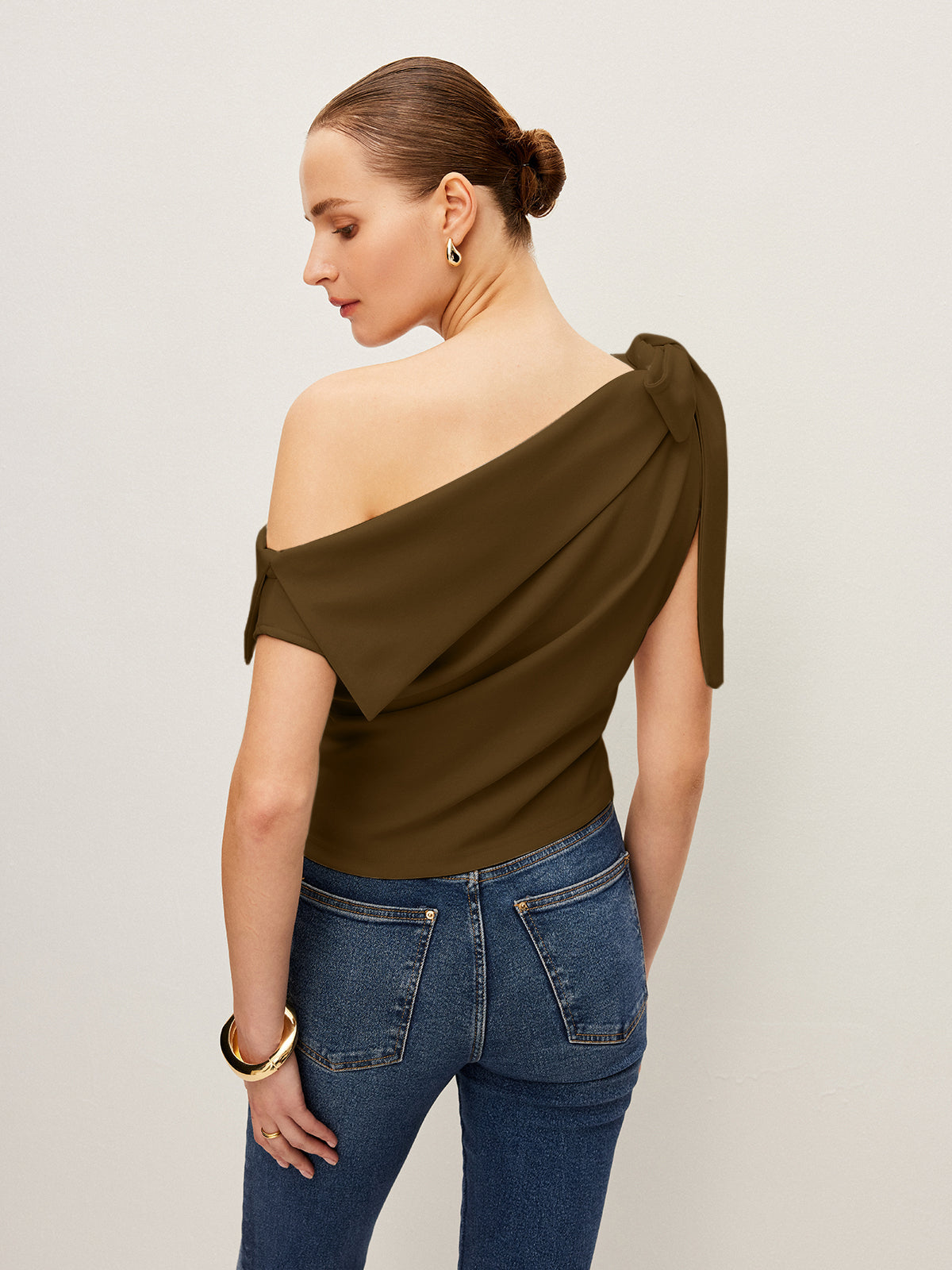 One-Shoulder Blouse Featuring Elegant Bow Detail