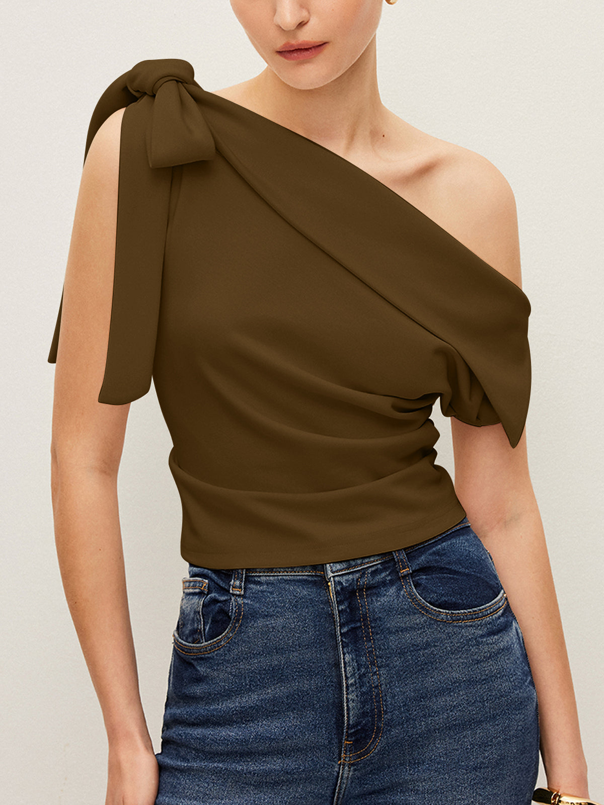 One-Shoulder Blouse Featuring Elegant Bow Detail
