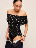Chic Off-Shoulder Bodysuit with Playful Polka Dots