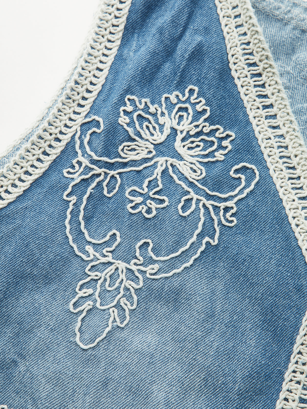 Stylish Denim Vest with Detailed Embroidery and Buttons