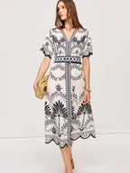 Boho-Inspired Floral Midi Dress with V-Neck Design