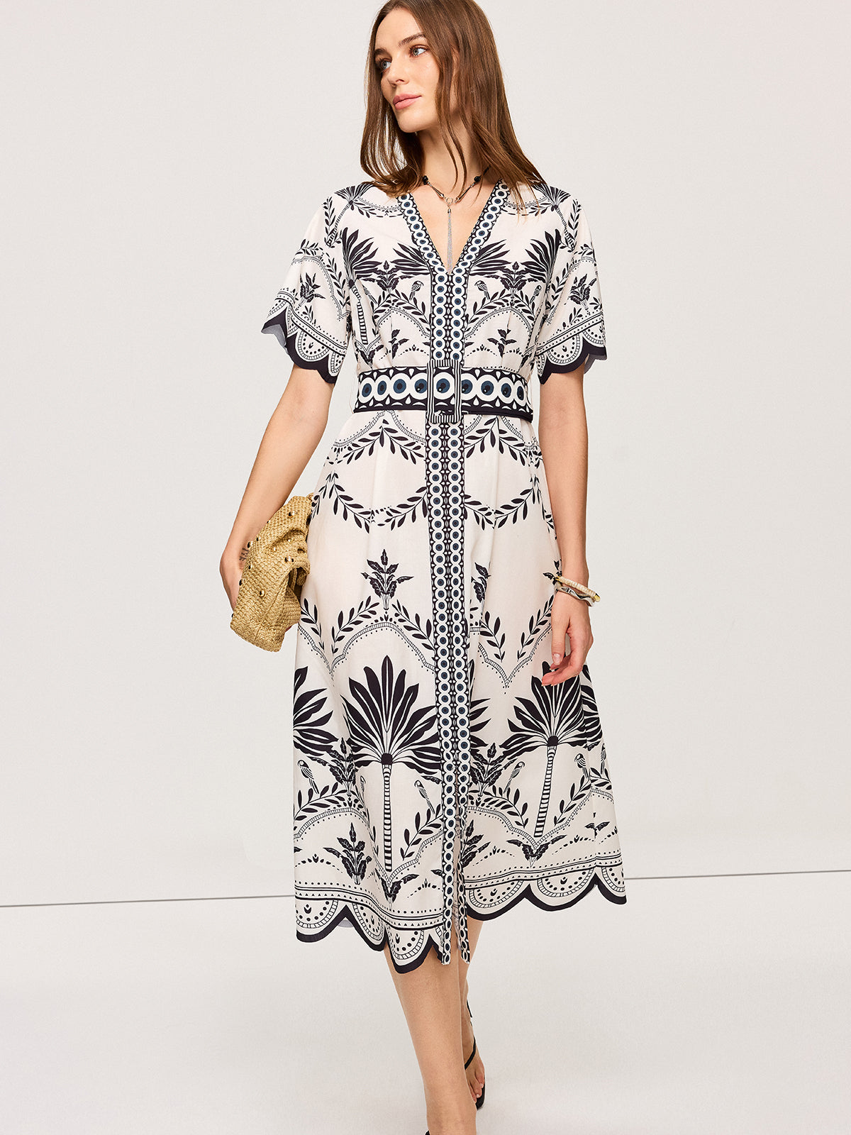 Boho-Inspired Floral Midi Dress with V-Neck Design