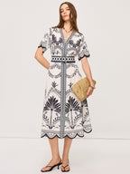 Boho-Inspired Floral Midi Dress with V-Neck Design