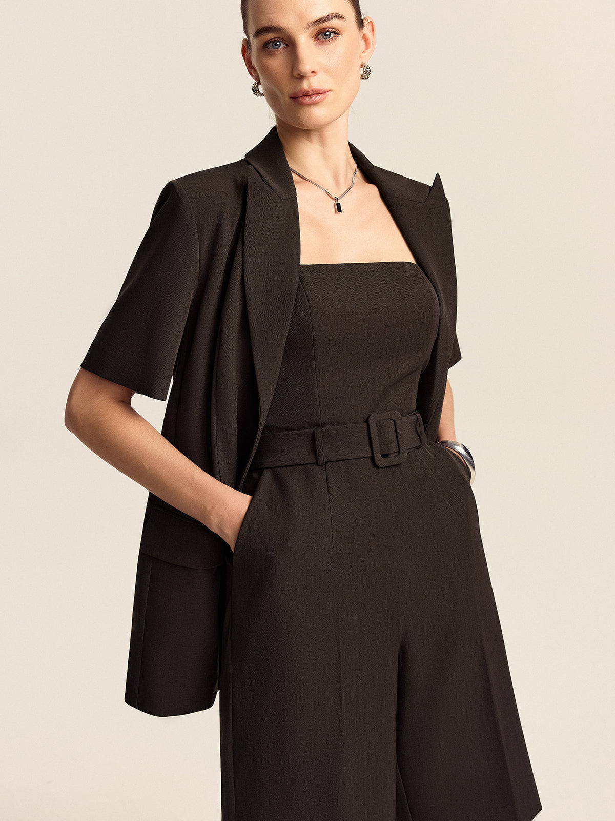 Sleeveless Jumpsuit with Belt Detail