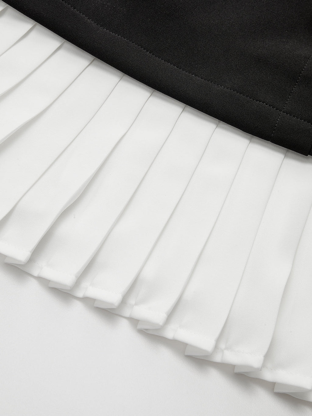 Asymmetric Mini Dress with Pleated Hem and Metal Detail