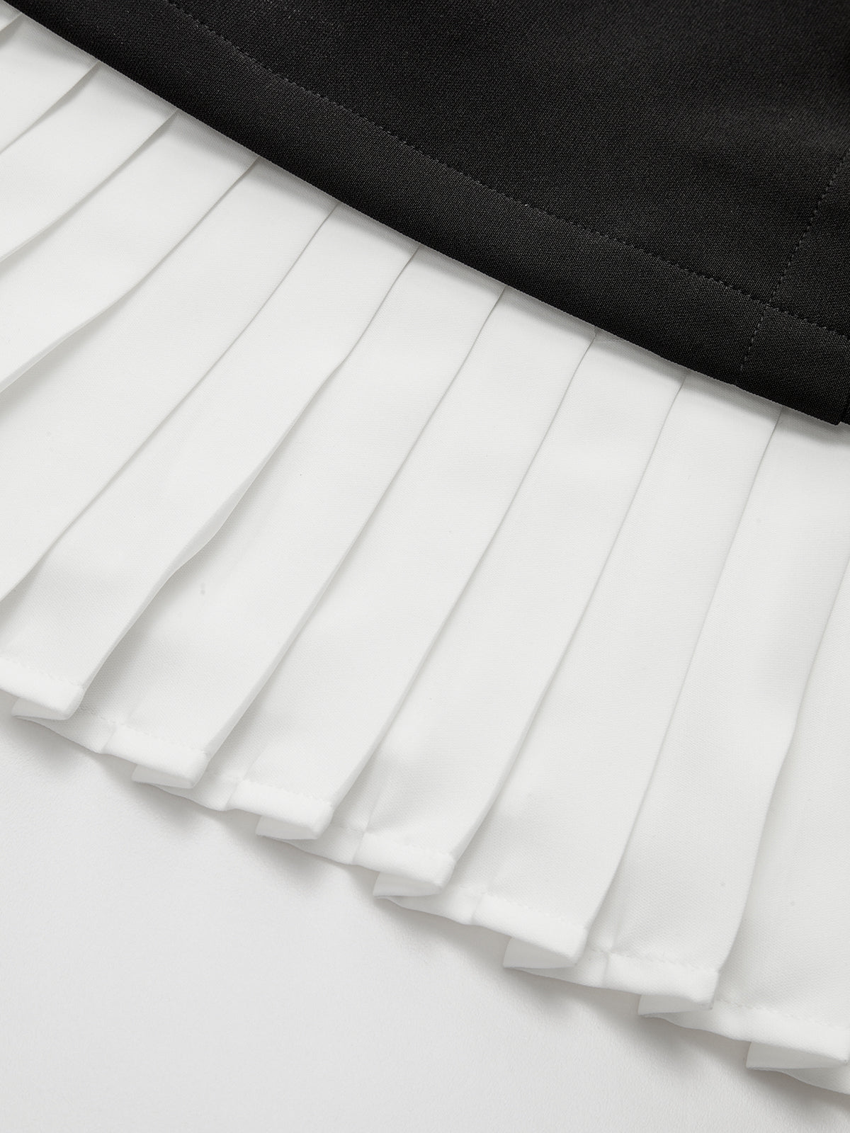Asymmetric Mini Dress with Pleated Hem and Metal Detail