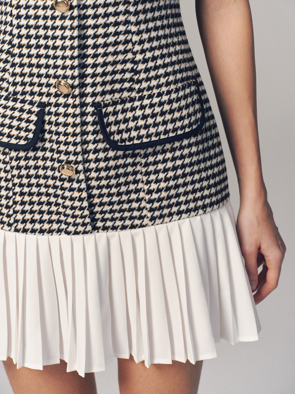 Houndstooth Sleeveless Mini Dress with Pleated Hem
