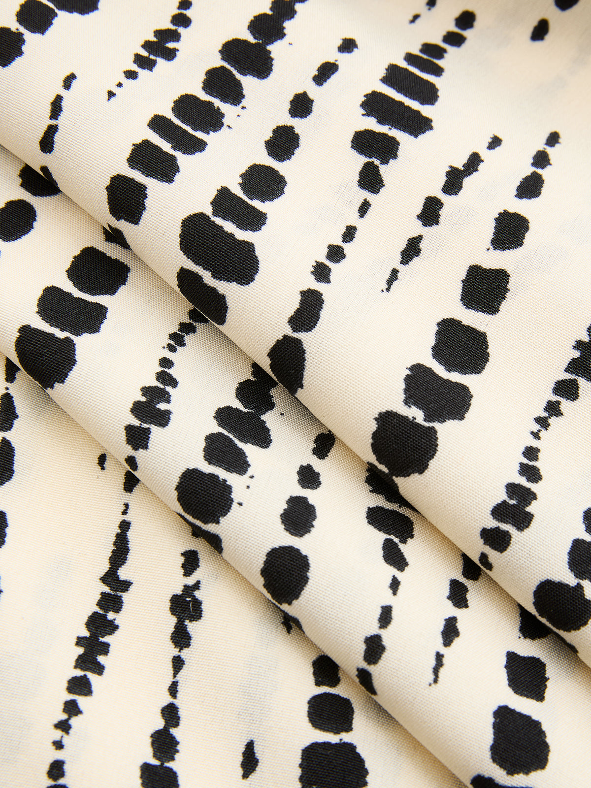 One-Shoulder Jumpsuit with Abstract Dot Design