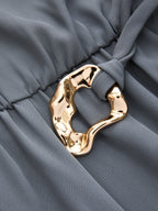 One-Shoulder Jumpsuit with Belt and Draped Design