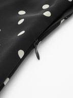 V-Neck Dress with Polka Dots and Ruffle Accents