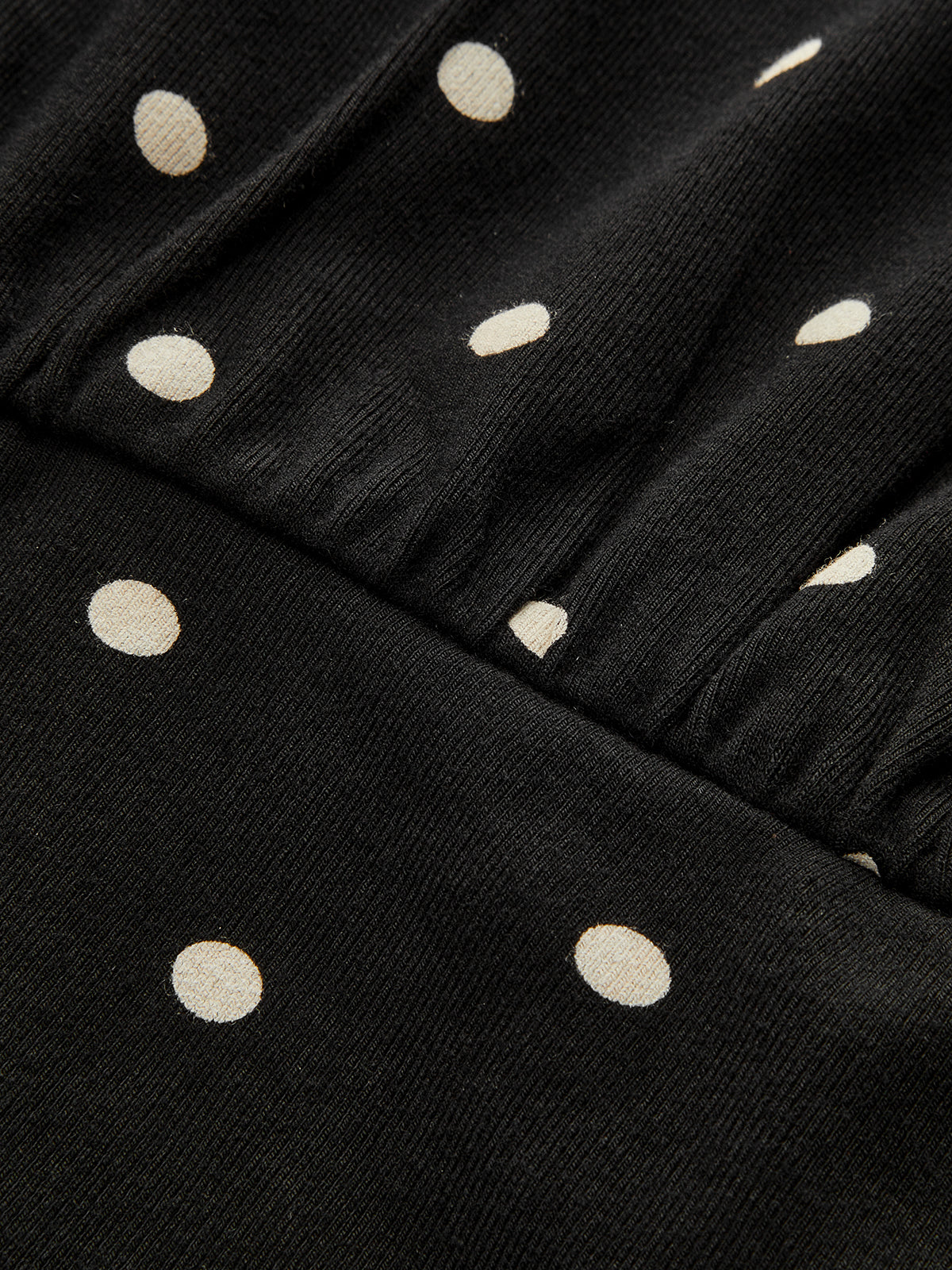 Polka Dot Batwing Top with Cinched Waist Design