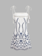 Embroidered Mini Dress with Tassel Tie Detail