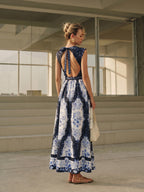 Flowing Maxi Dress with Floral Print and Open Back
