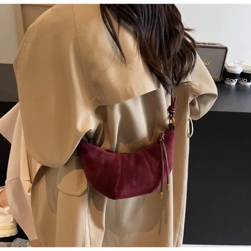 Suede crescent crossbody bag