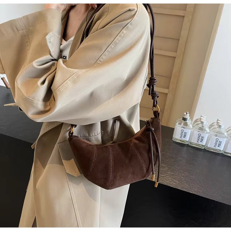 Suede crescent crossbody bag