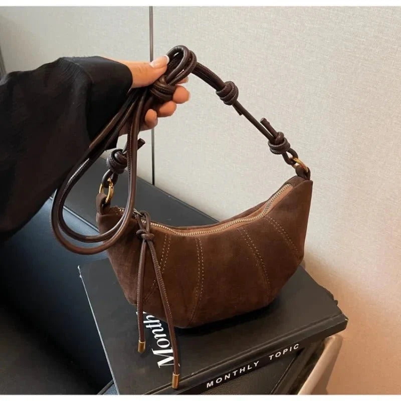 Suede crescent crossbody bag