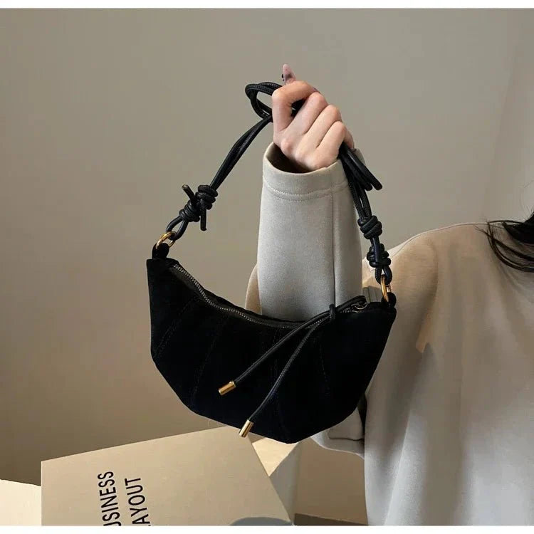 Suede crescent crossbody bag