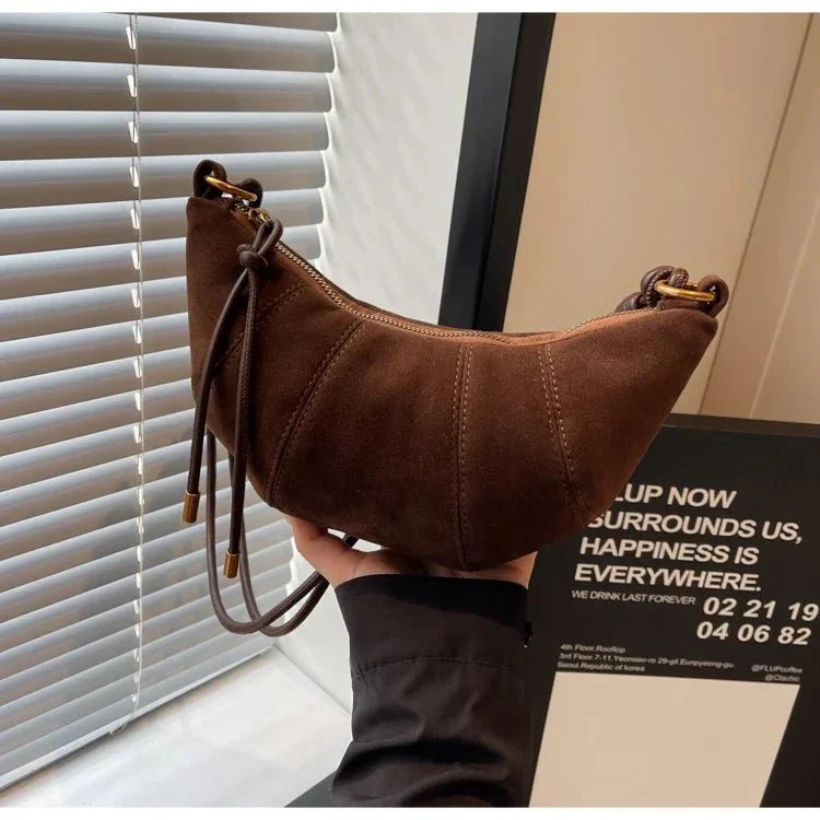 Suede crescent crossbody bag