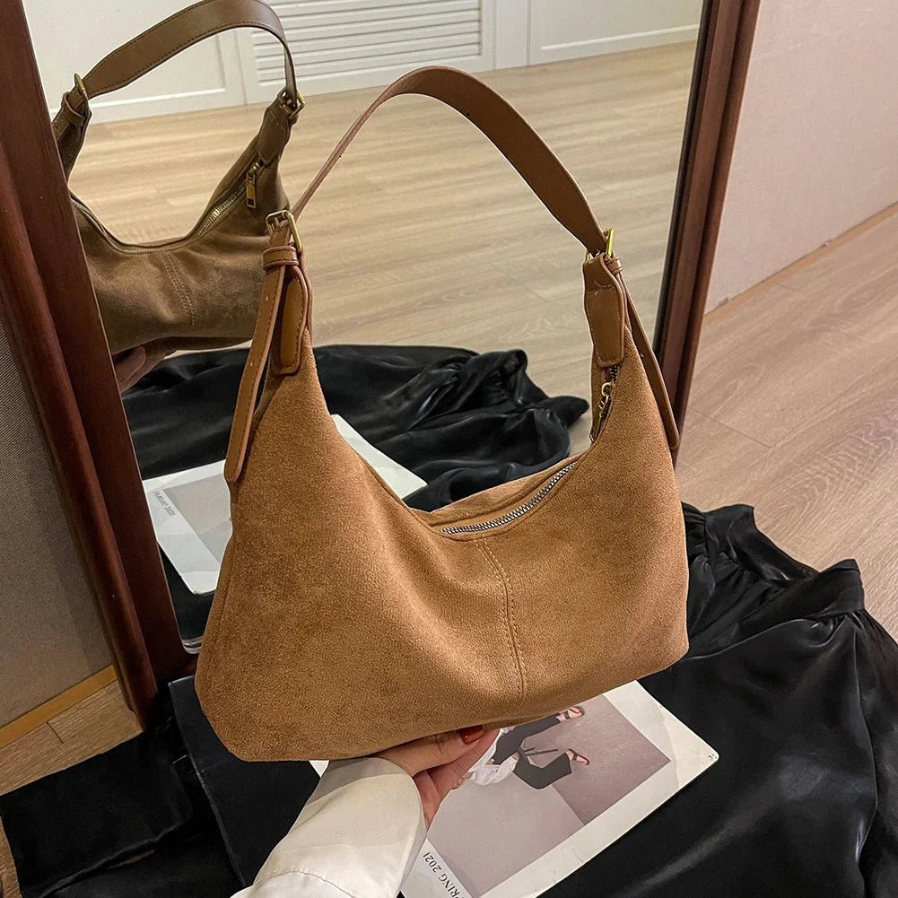 Suede crescent crossbody bag